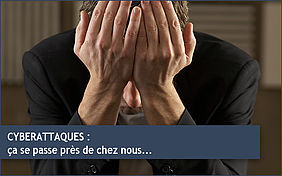 Homme baissant la tête, masqaunt son visage par ses mains façe aux problèmes de la cybertattaque